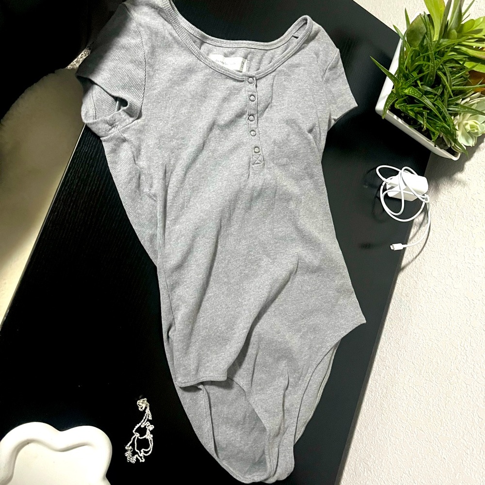 ripped Abercrombie with buttons